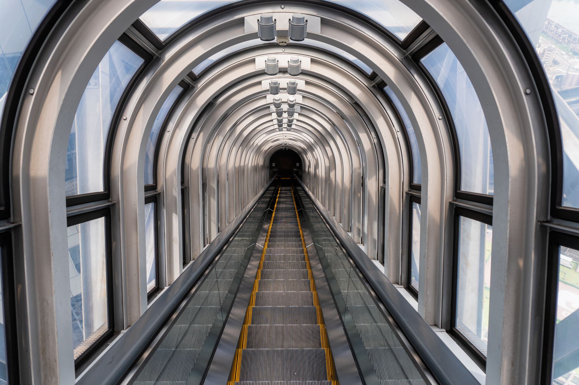 Grey arches inside a building.