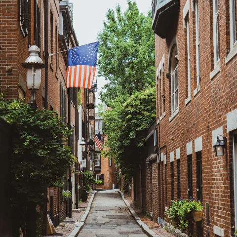 Street lined with brick buildings during daytime