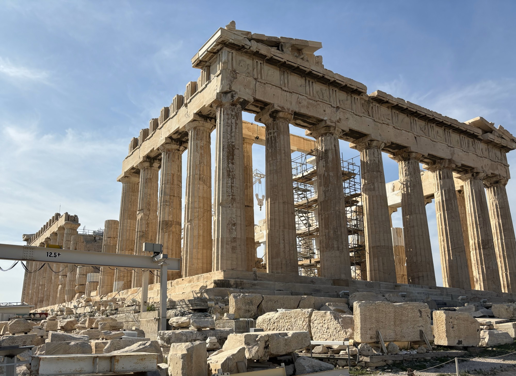 A building ruin with pillars on a sunny day.