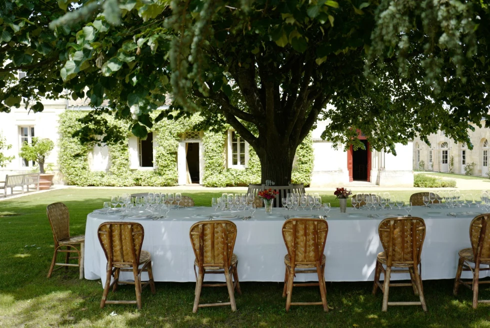 a table at a French villa set for a champagne tasting