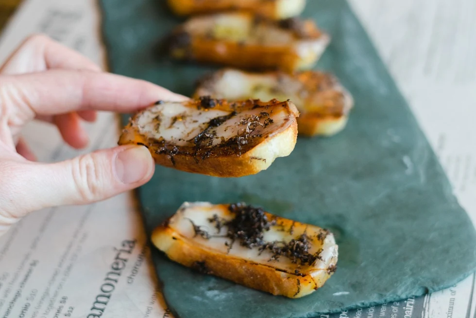 Hip eatery in a former 1927 bus depot offering elevated small plates, cured meats, sherries & wine.