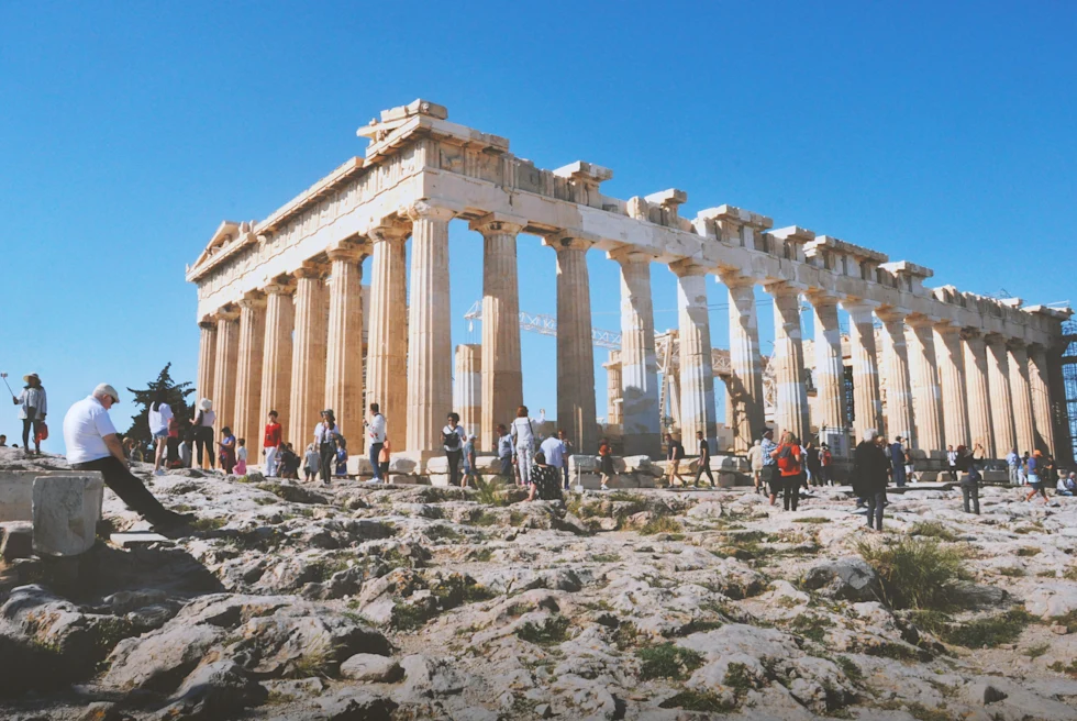 Acropolis surrounded by tourists.