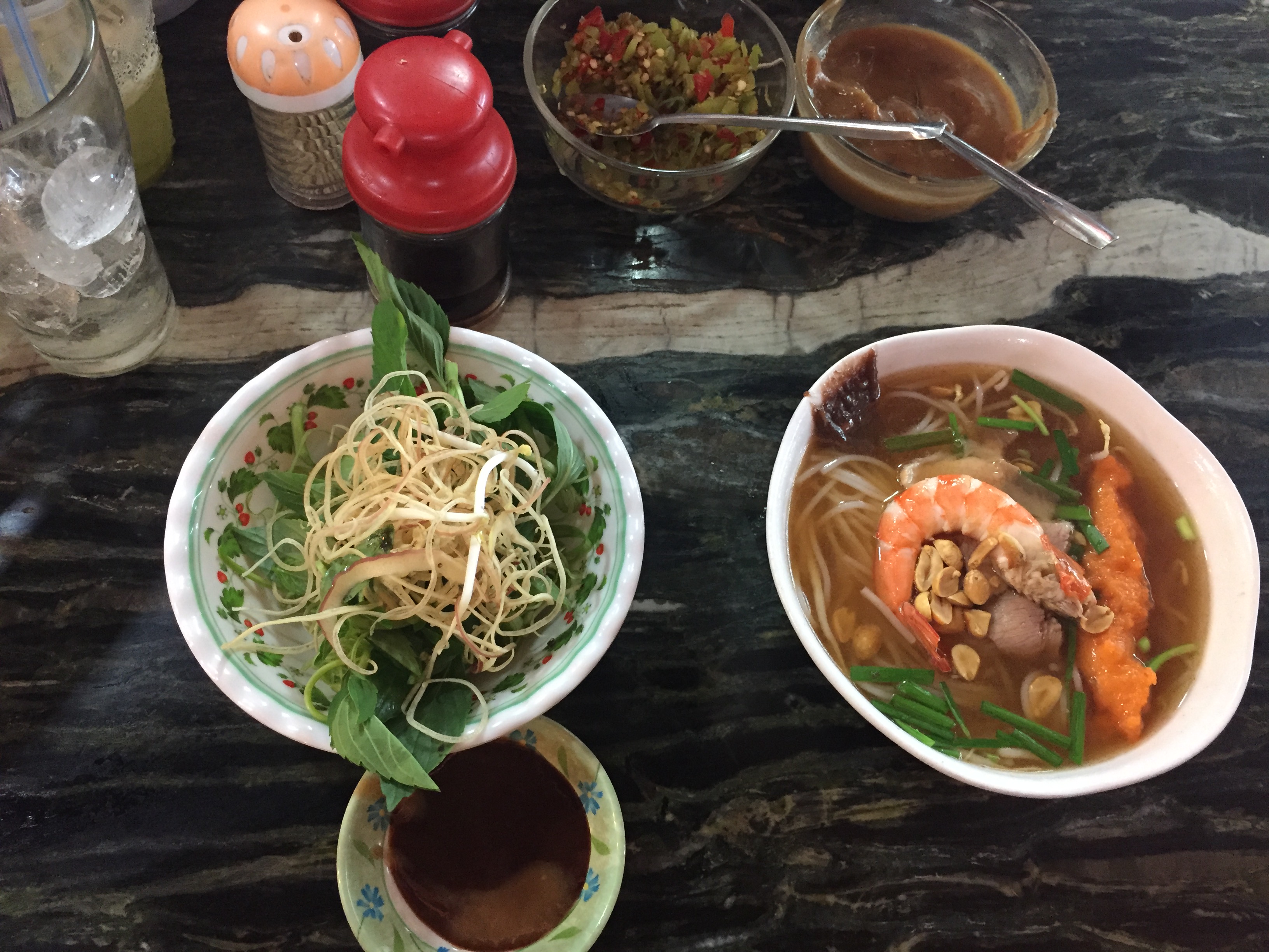 two bowls of food on table 