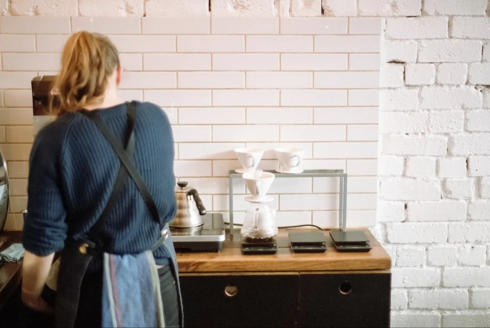 woman preparing coffee