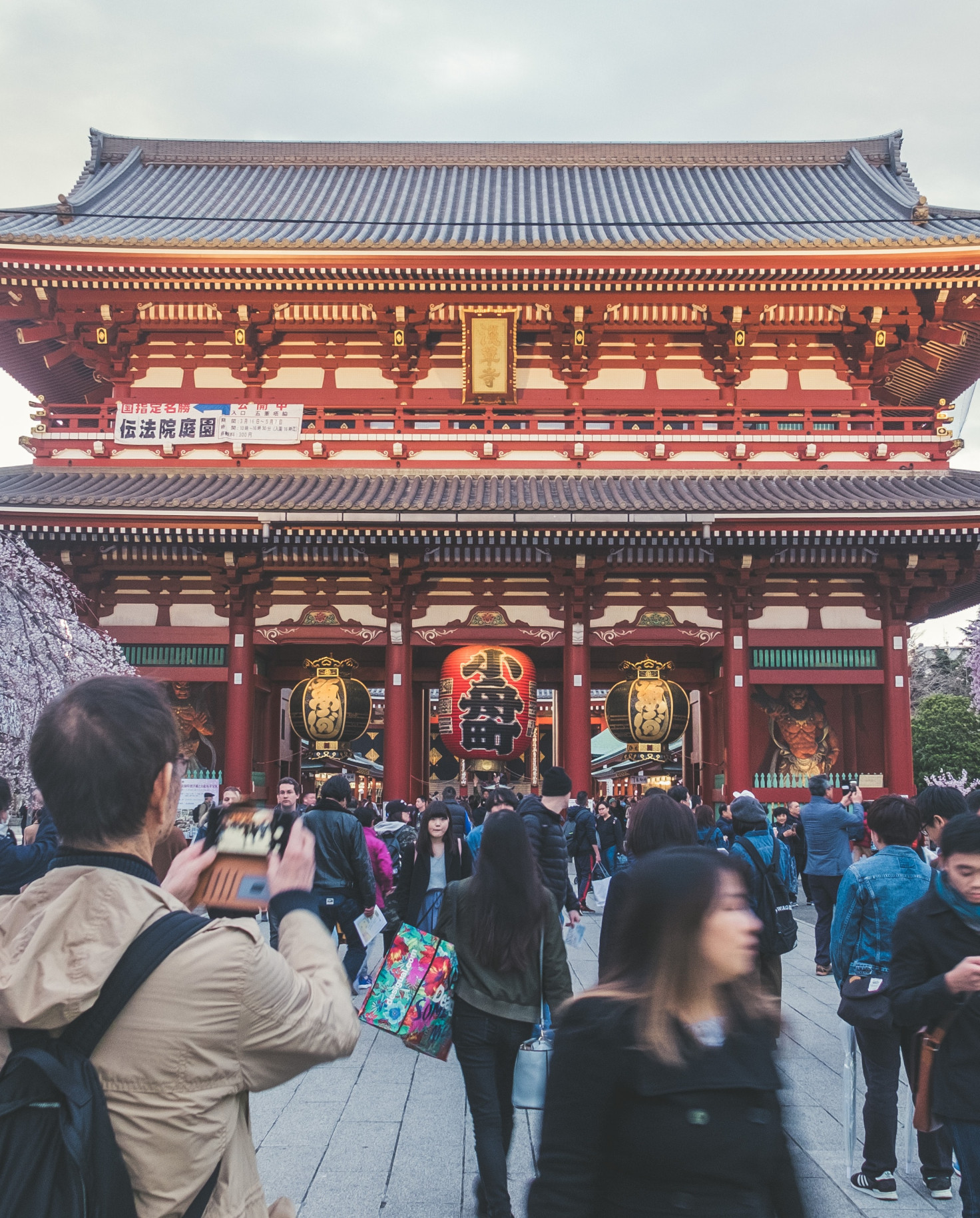 people standing in front of temple 