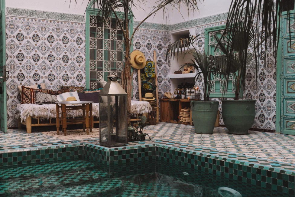 Riad in Morocco with intricate tiling and a pool