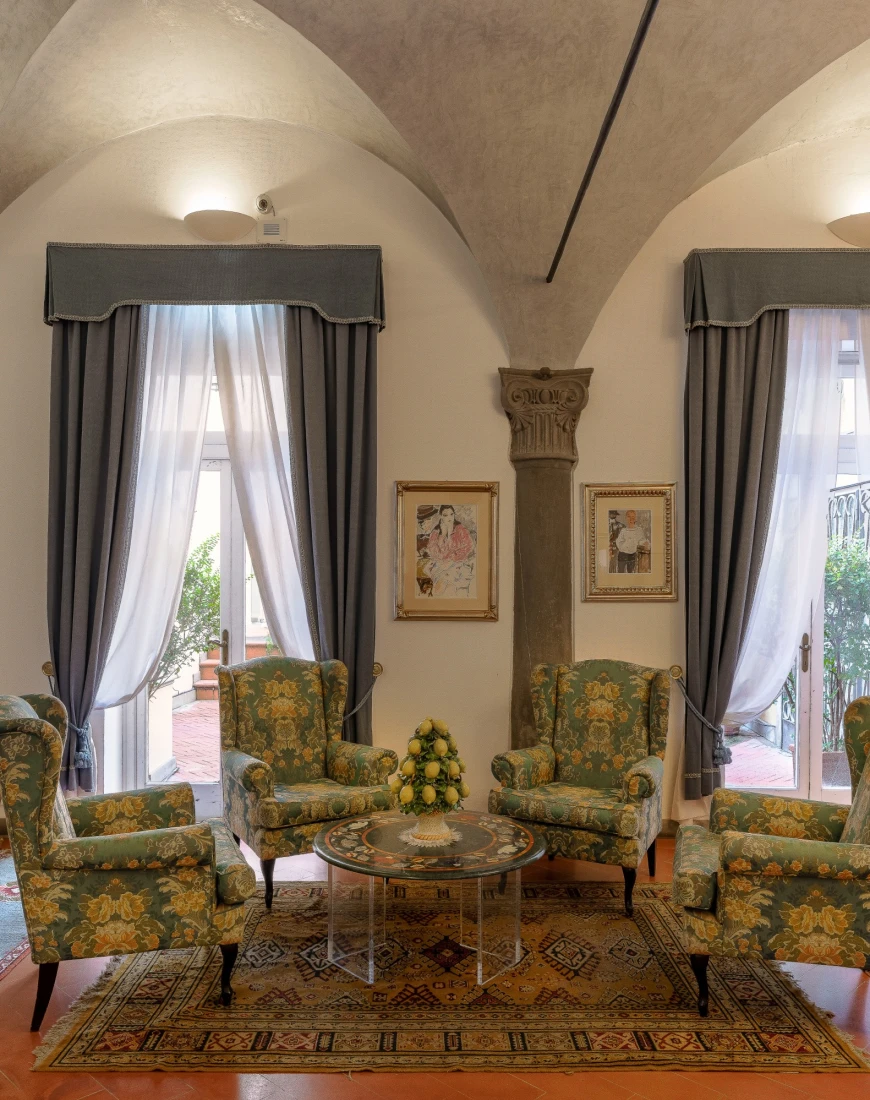 patterned upholstered chairs in an ornate living room