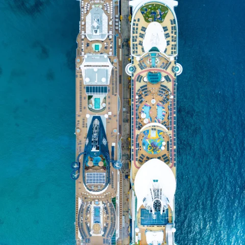 An aerial view of the two white cruise ships