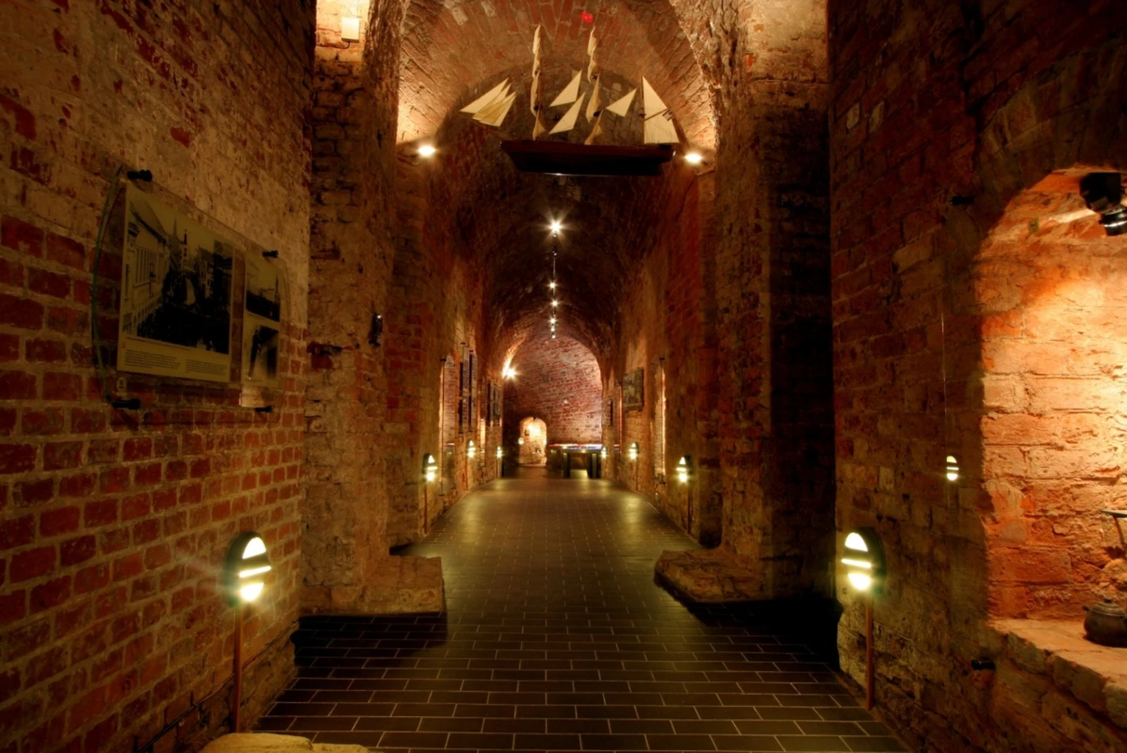 interior of a castle museum in candle light