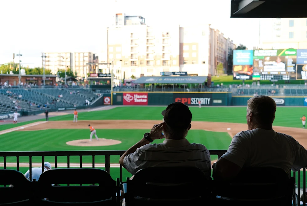 People watching match in a stadium