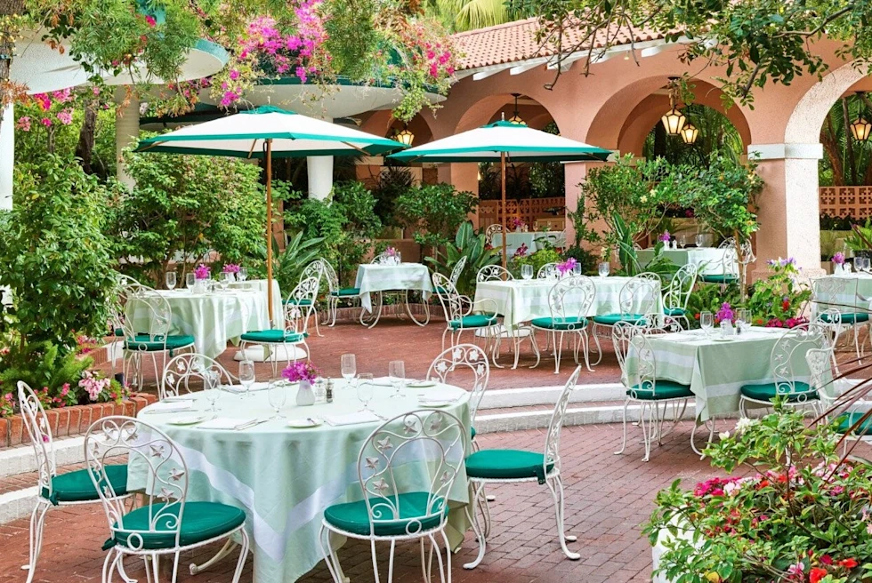 Polo Lounge is an iconic Hollywood hideaway within The Beverly Hills Hotel, where timeless elegance and celebrity allure converge over exquisite dining and classic cocktails.