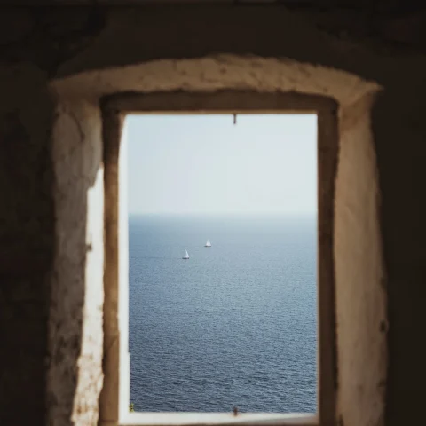 ocean through stone window