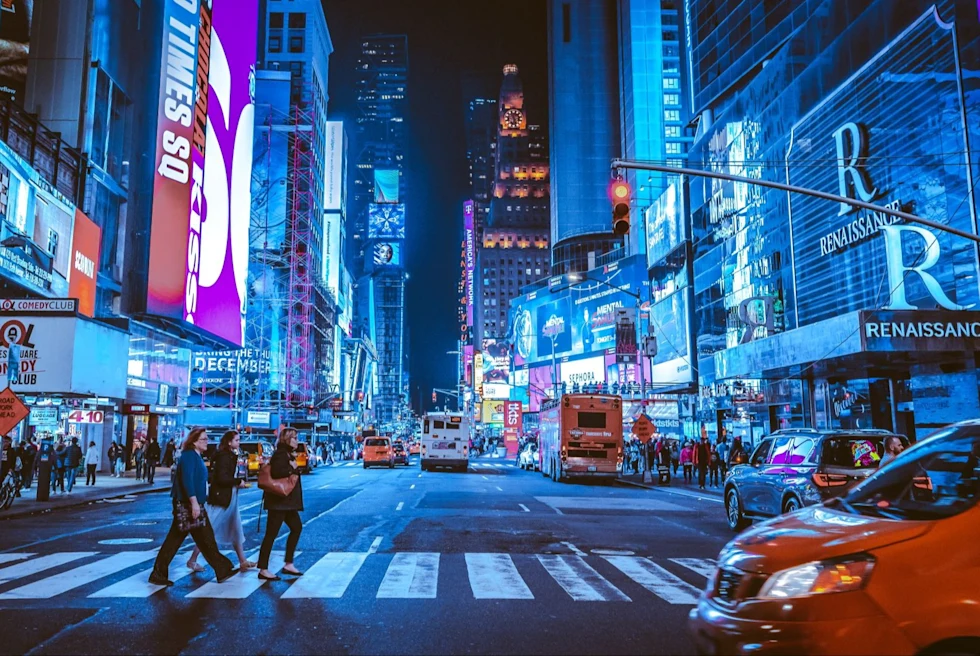 Buildings lit in blue at night. in New york