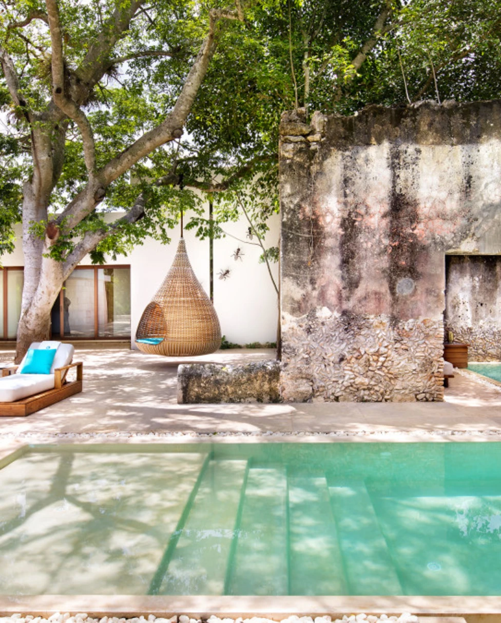 Poolside view of Chable Yucatan with crystal clear waters in an outdoor setting