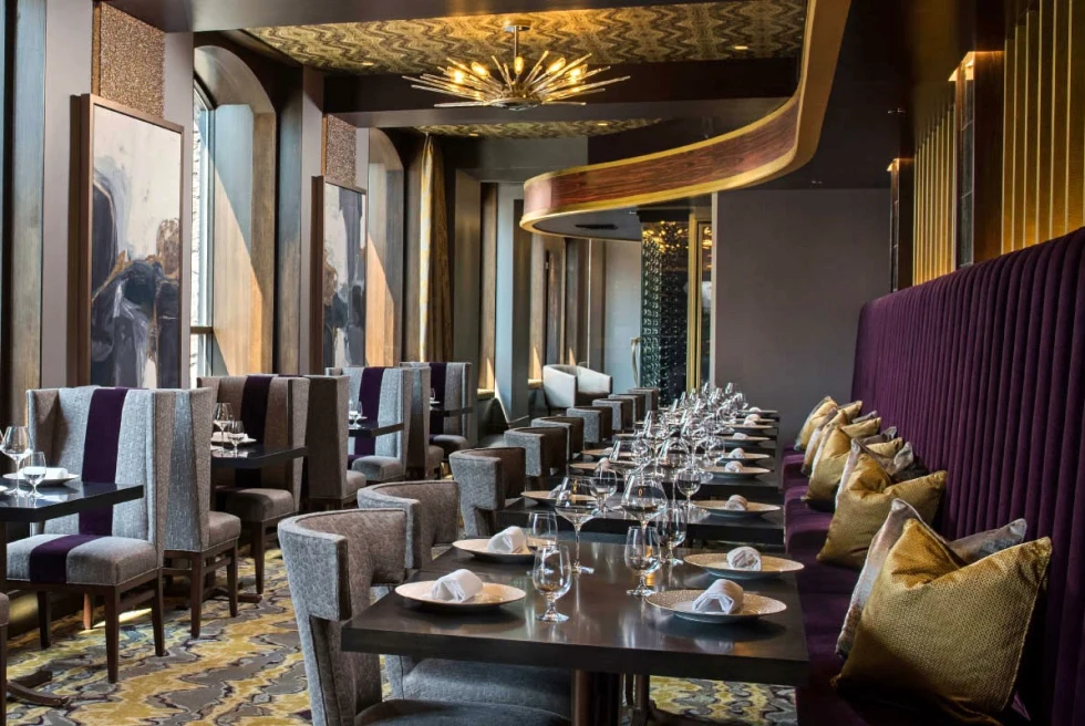 restaurant with rich interiors of purple and gold velvet