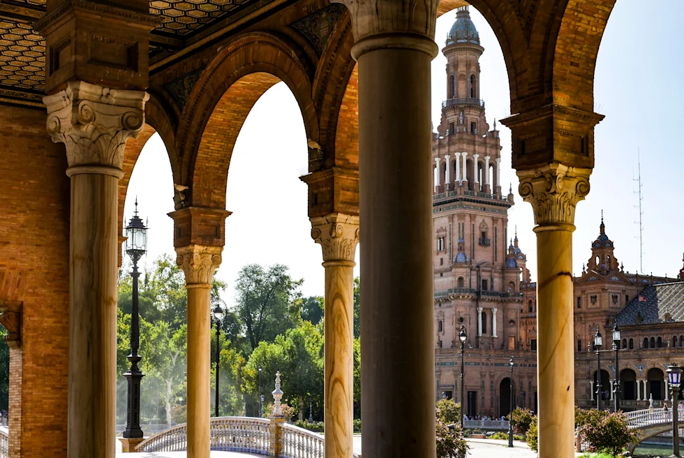 Archways with building in background during daytime