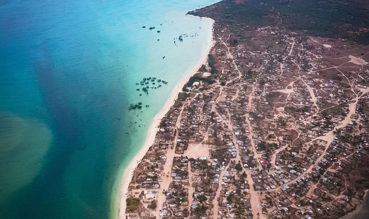 Aerial view of a small town on a beach.