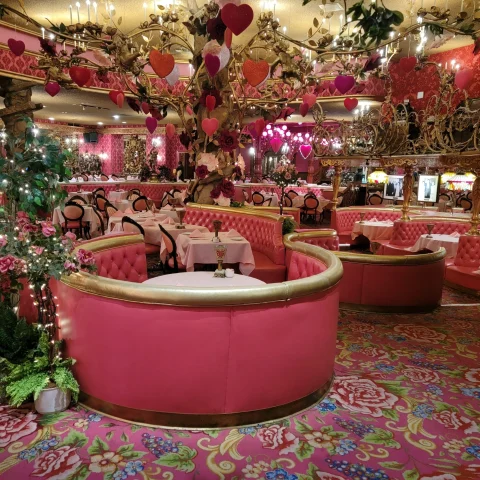 An indoor red colored restaurant