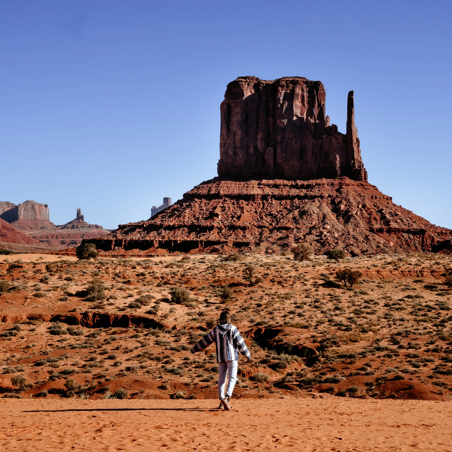 Picture of a woman standing in a dried region