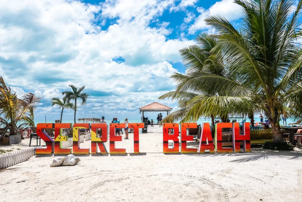 Secret Beach sign in Belize. 