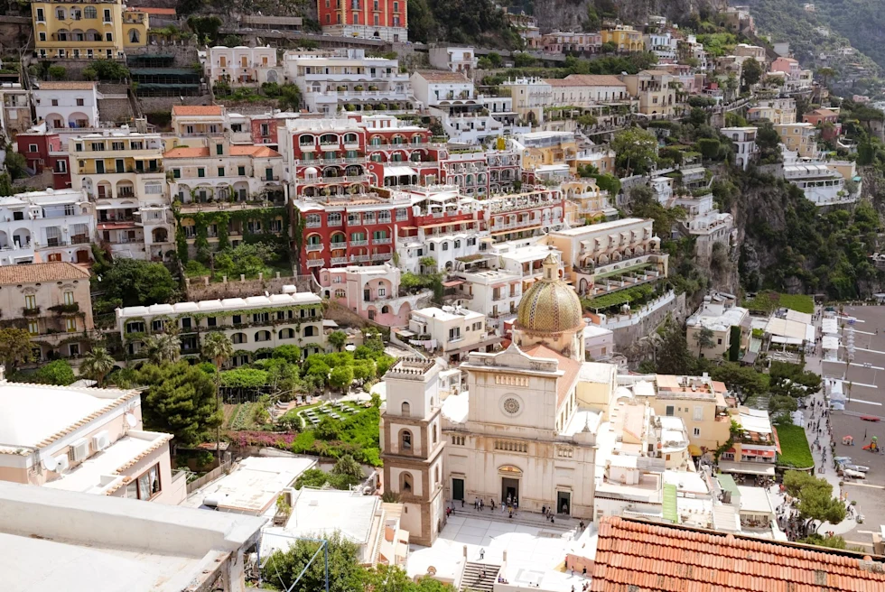 Concrete City Buildings on the Mountain Slope Near the Coast