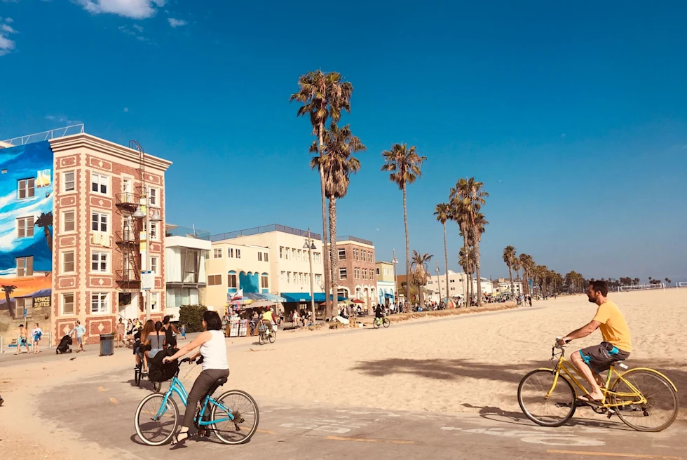 venice beach boardwalk with bikers