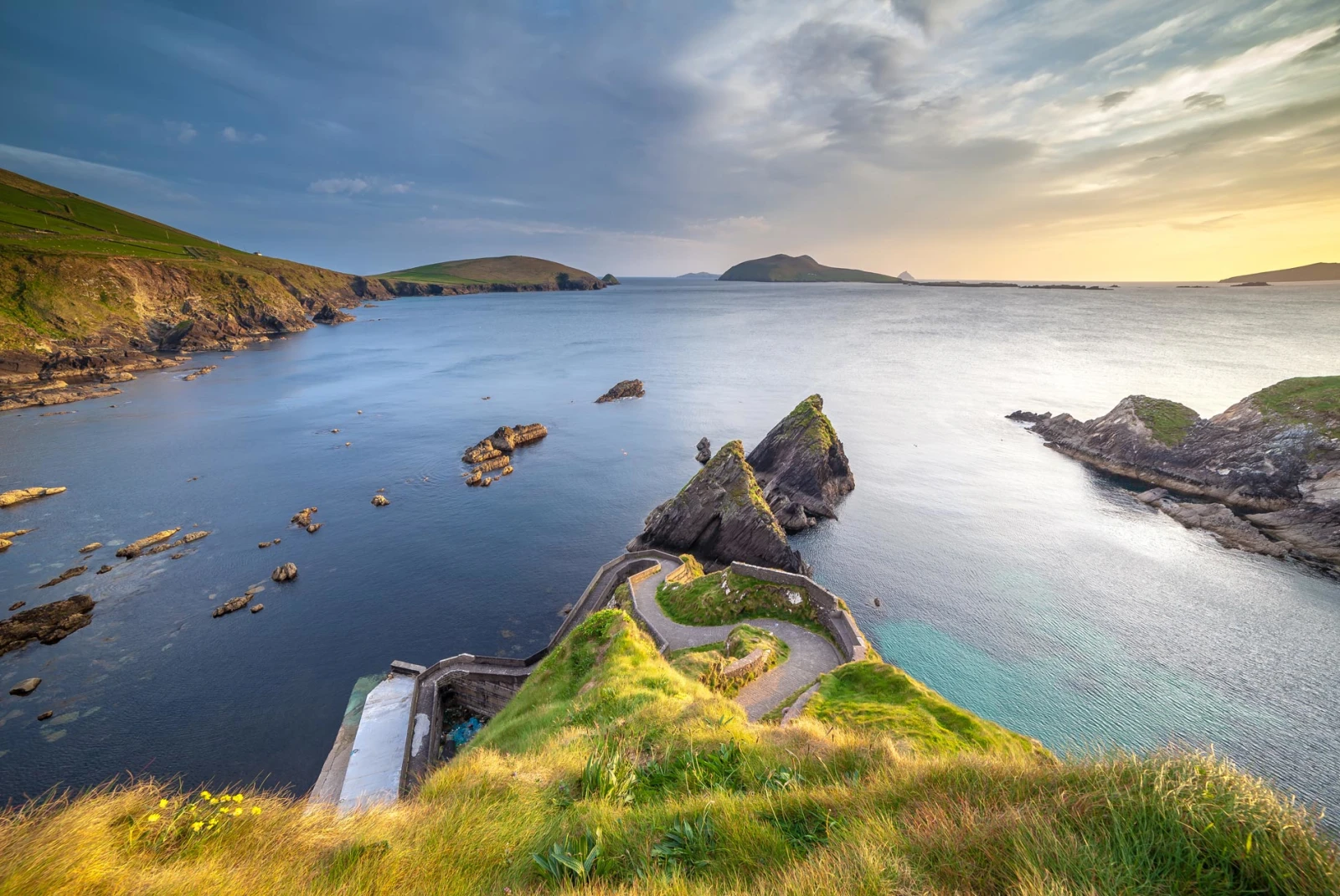 Dingle Peninsula is a rugged coastal gem on Ireland's western edge, where ancient heritage, charming villages, and awe-inspiring landscapes converge in a captivating tapestry.