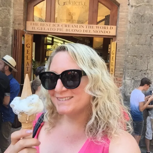 Travel advisor Allie Frank holding an ice cream cone of gelato.
