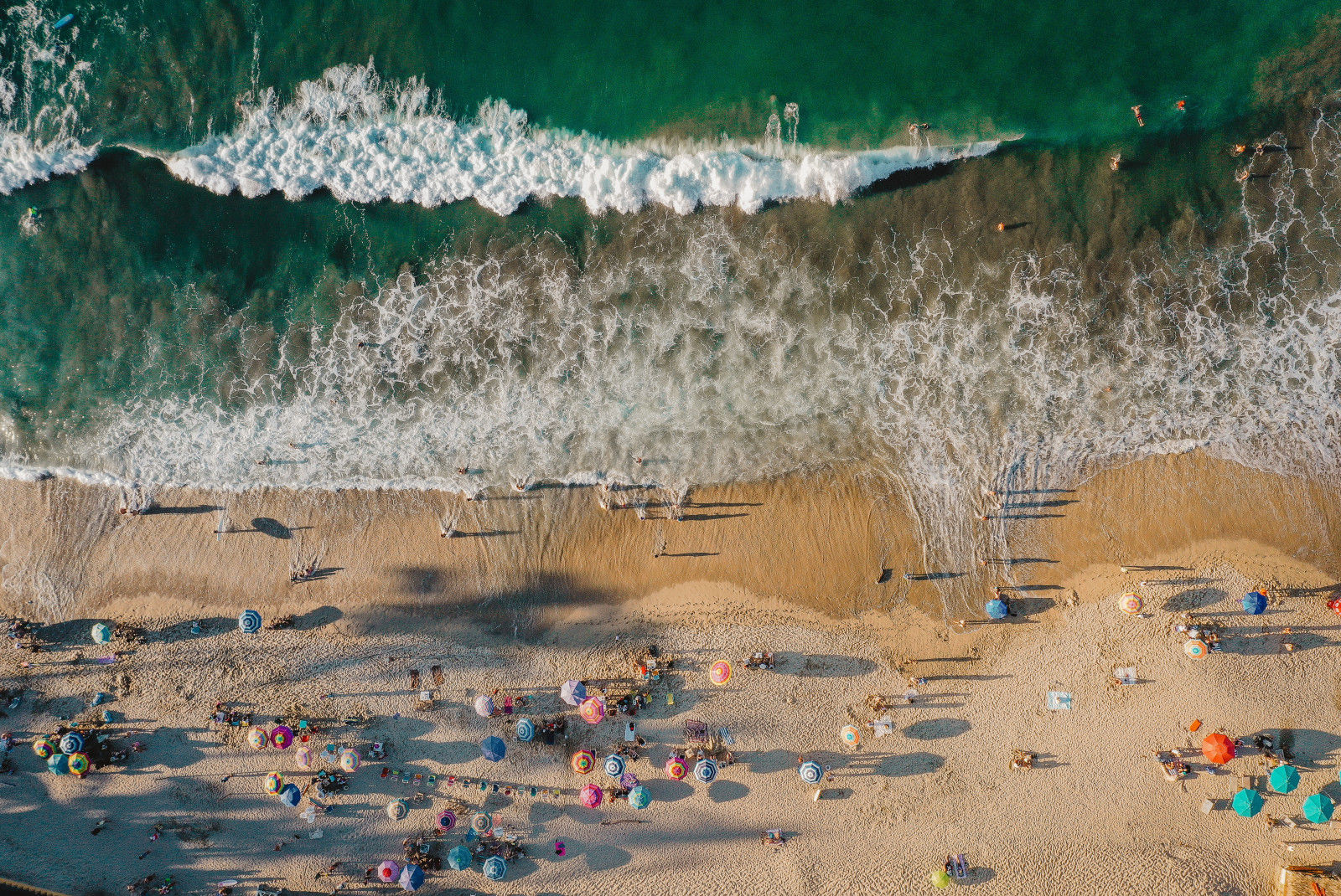 Beautiful blue beach with surfers in Sayulita, Mexico. 