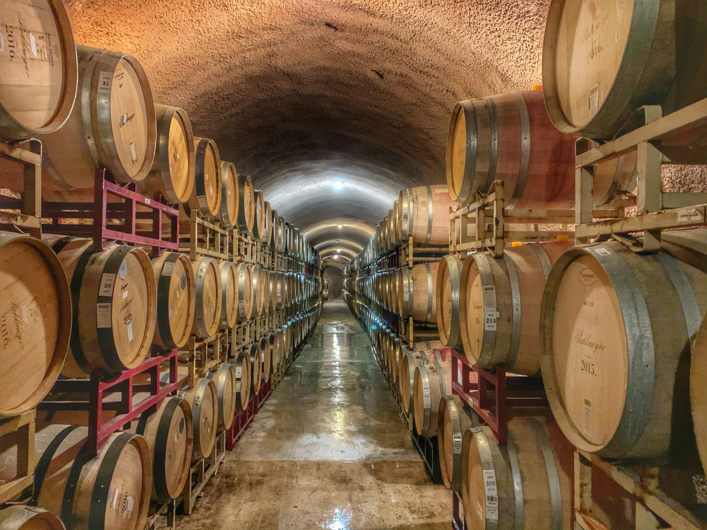 Wine barrels with wine in a cellar in Calistoga. 