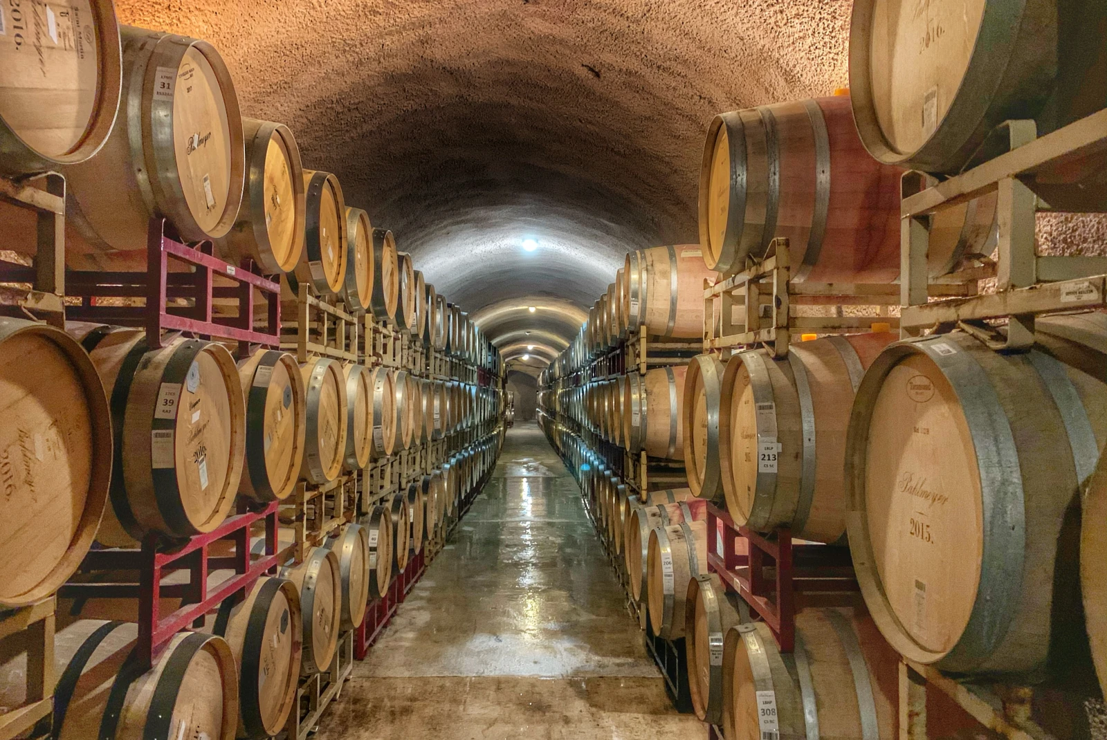 Wine barrels with wine in a cellar in Calistoga. 