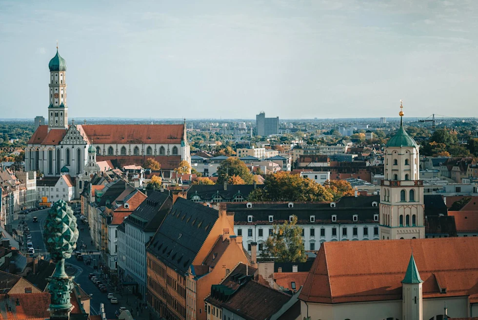 Skyline view of historic buildings and streets in Augsburg, Germany.