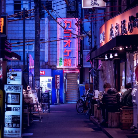 A neon-lit street in Tokyo, Japan. 