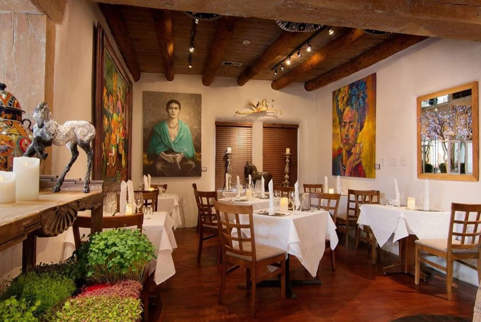 Mexican restaurant in Santa Fe featuring a painting of Frida Kahlo. 