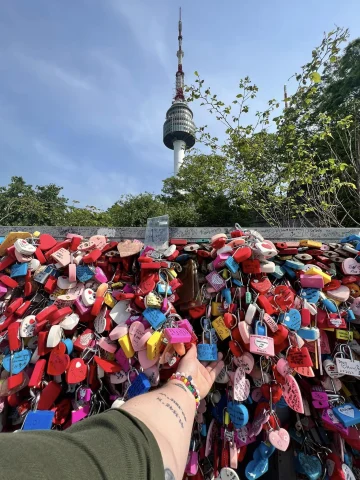Love locks on a bridge in front of the Namsan Tower in Seoul, South Korea