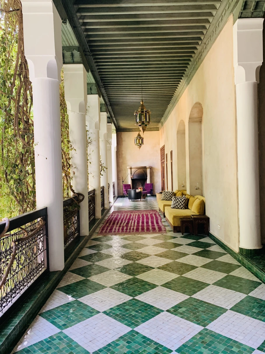 sunny colonnade with a green-and-white checkered floor