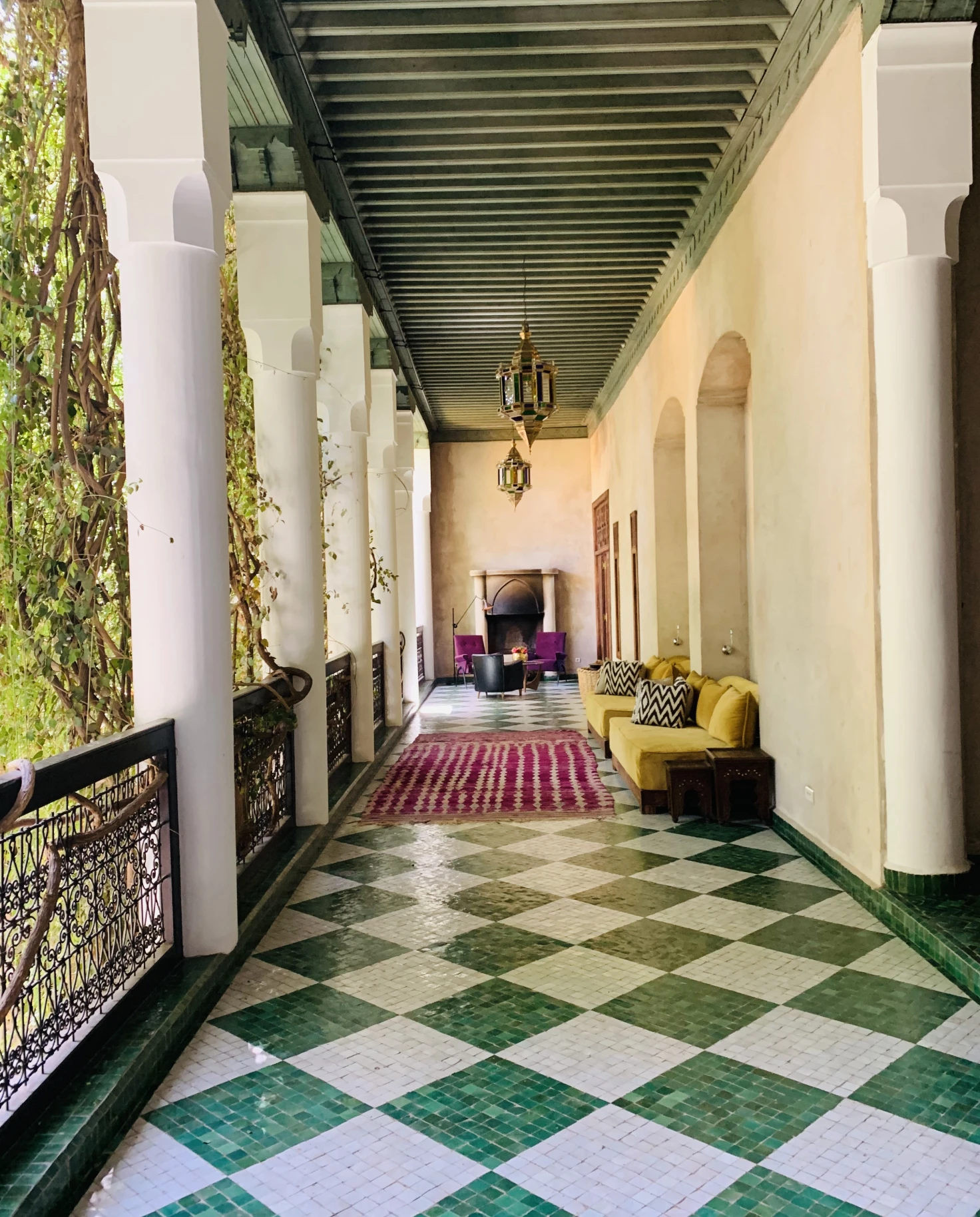 sunny colonnade with a green-and-white checkered floor