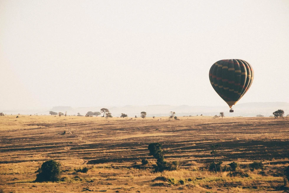 Hot air balloon safari over African plain in Serengeti, Tanzania.