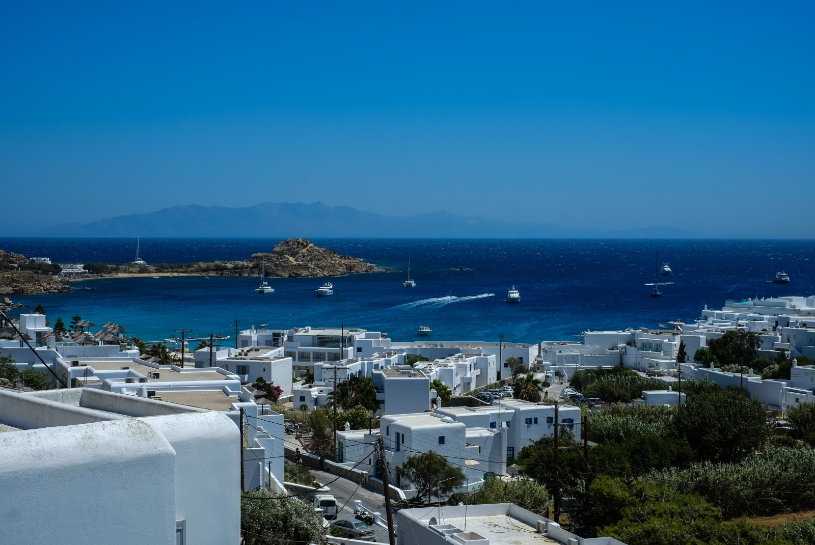 white buildings next to body of water during daytime