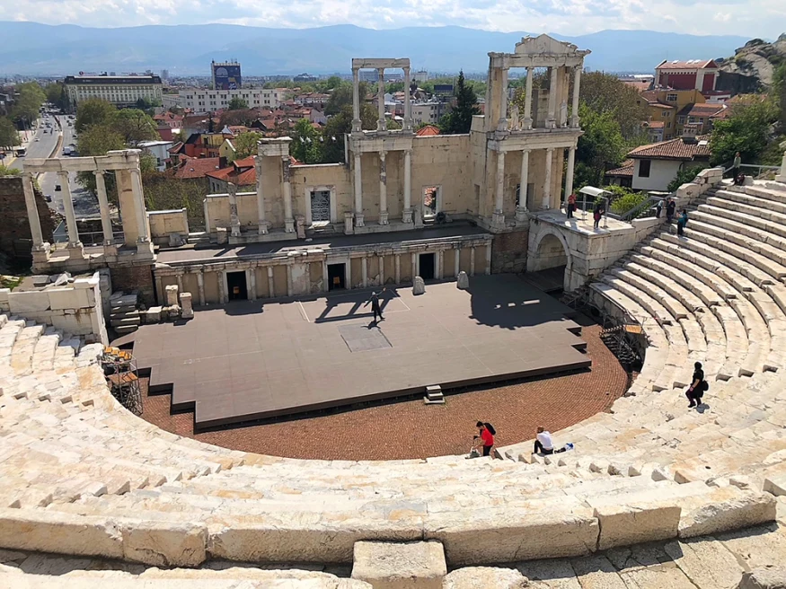 Sofia Bulgaria stone stairs ruins amphitheater small stage city view and mountains 