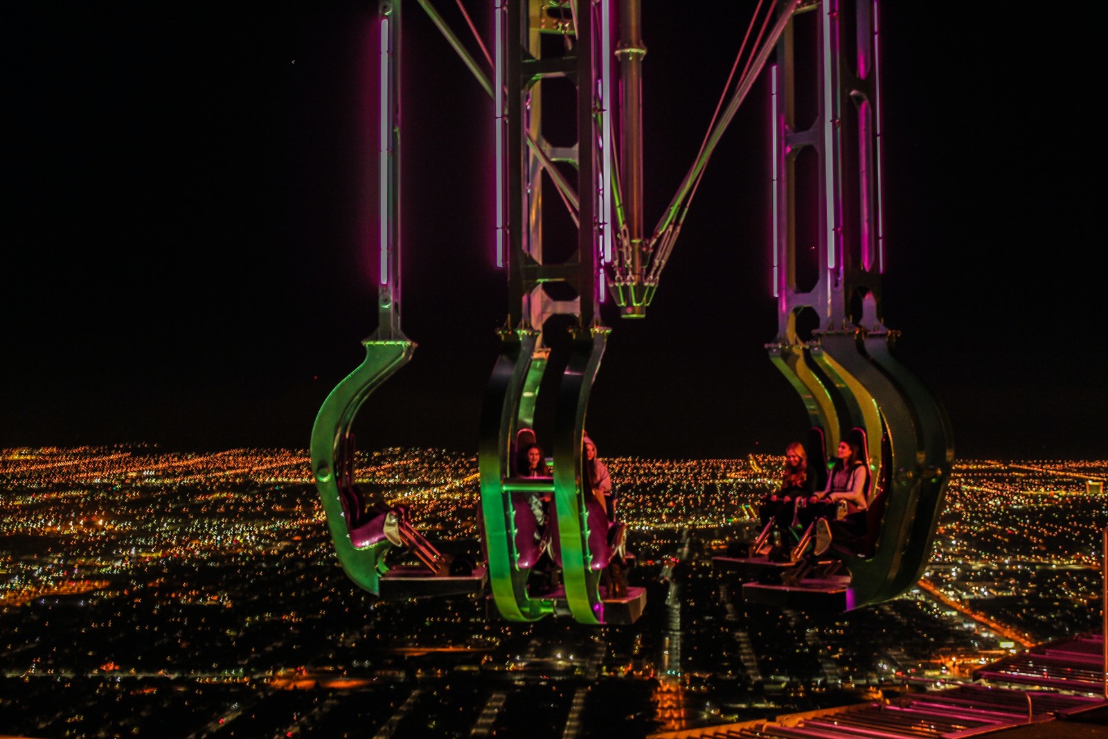 Las Vegas amusement park with people suspended in the air. 