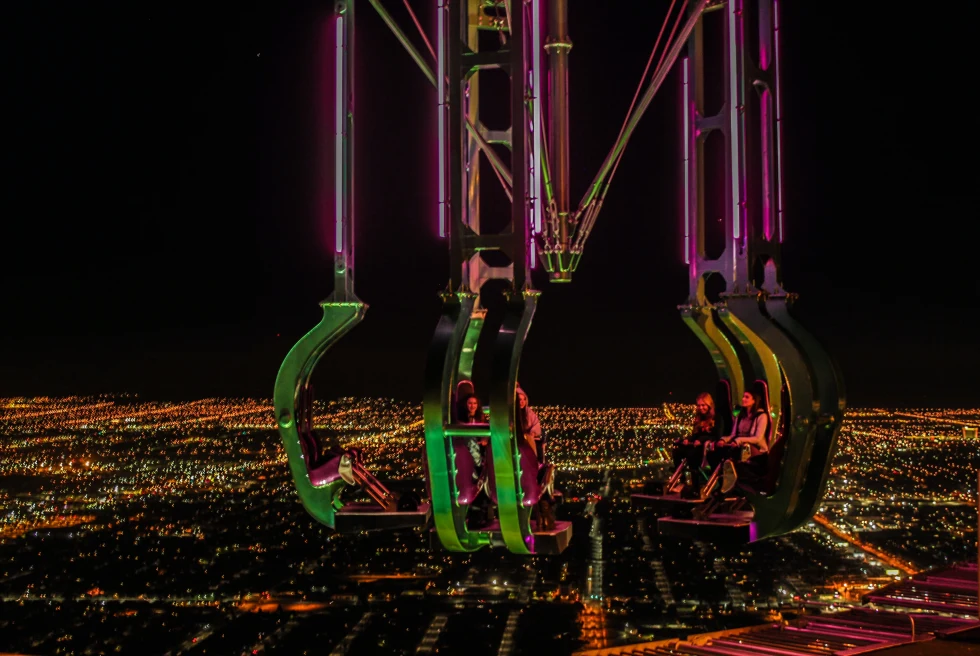 Las Vegas amusement park with people suspended in the air. 