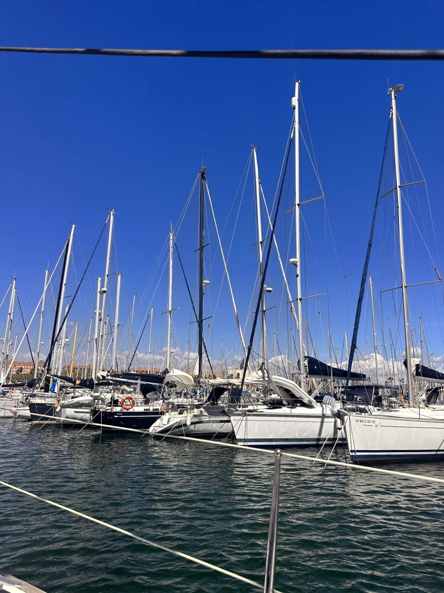 Row of boats ready for cruise at a marina in Barcelona.