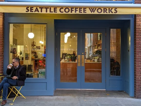 An entrance view of a coffee shop in Seattle