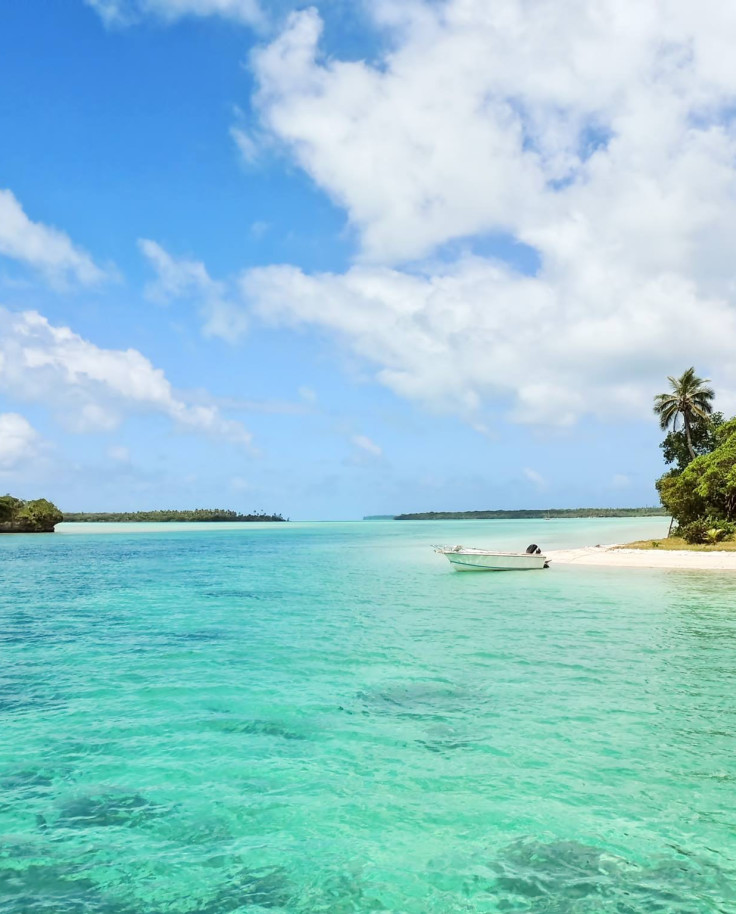 Clear blue water and white sand on a sunny day in Montego Bay, Jamaica