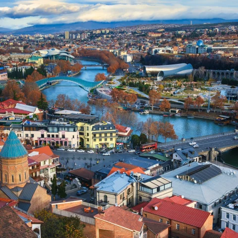 a rooftop view on a city on a river