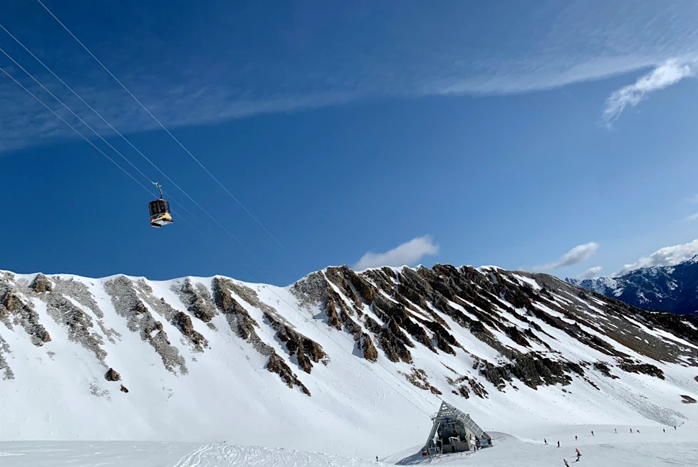 snow-capped mountains with blue skies