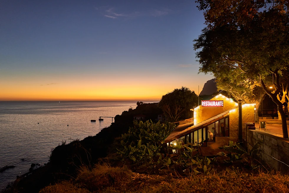 Restaurant at sunset on an island.