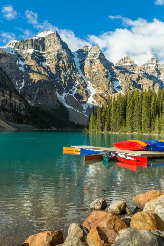 Canadian mountains, lake and boats. 