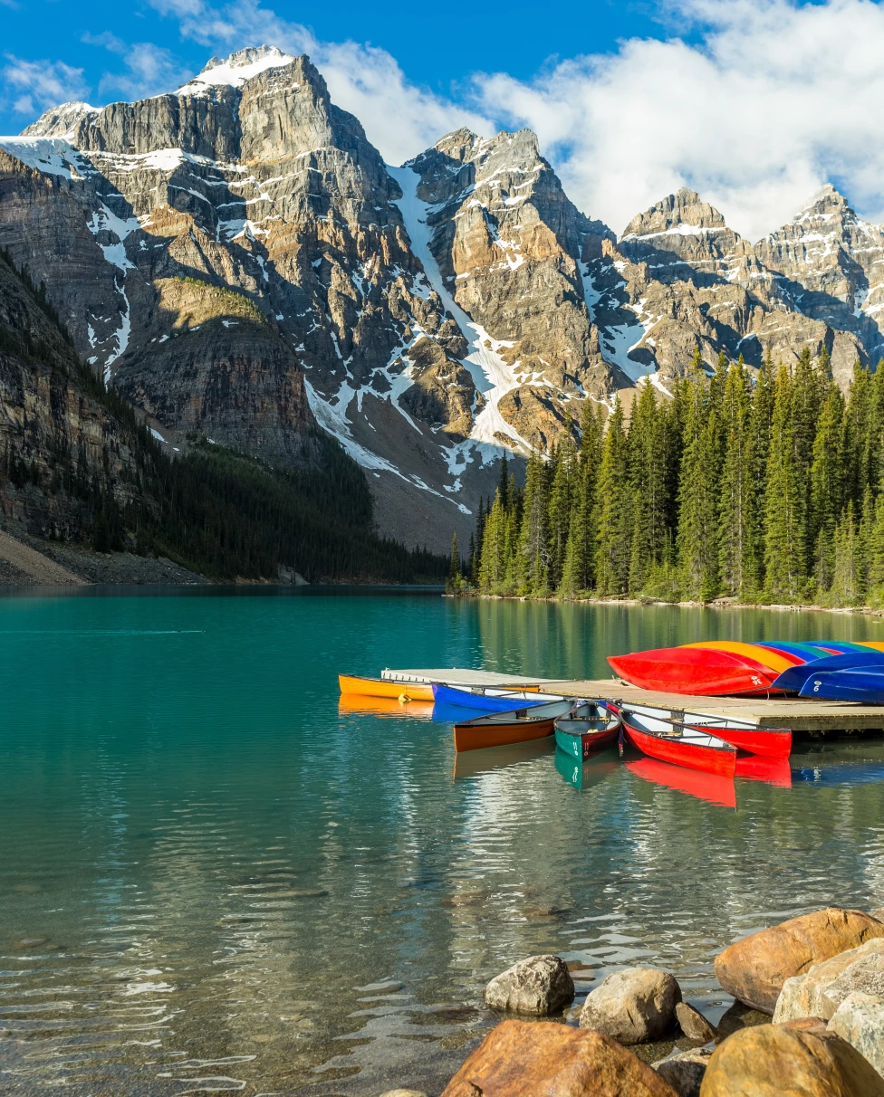 Canadian mountains, lake and boats. 